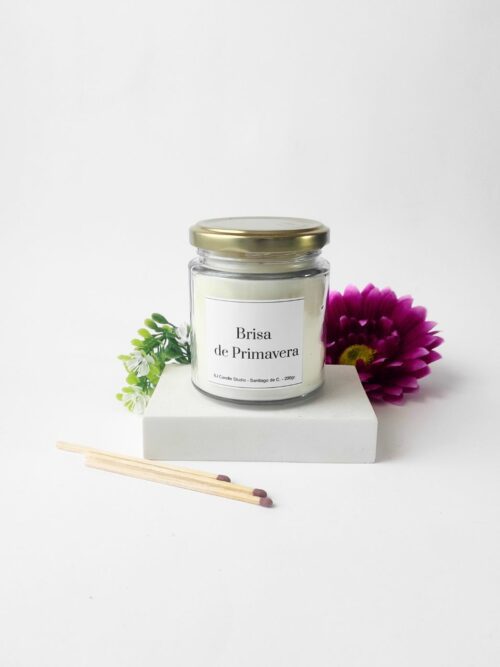 Vela de soja artesanal Brisa de Primavera con flor rosa y verde, estilo natural